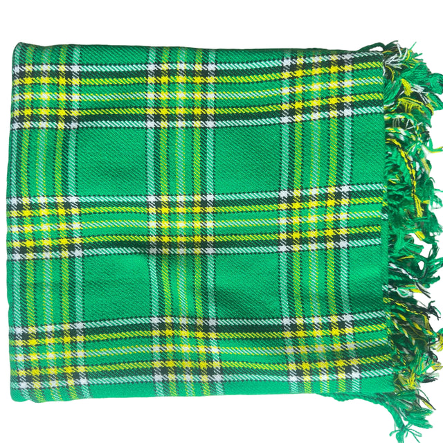 Green plaid fabric with yellow and white lines on a white background