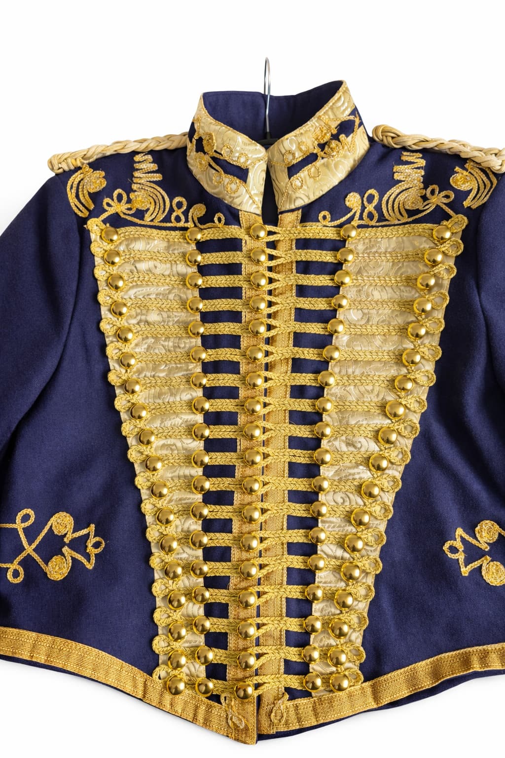 Navy blue military-style jacket with gold embroidery on a white background