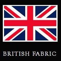 A square graphic showing the Union Jack flag above the words 'BRITISH FABRIC' in white serif text on a black background.