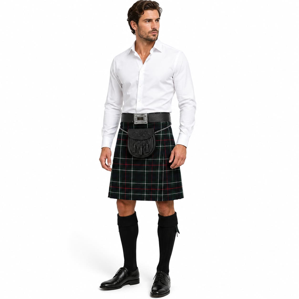 Man wearing a traditional Scottish kilt on a white background