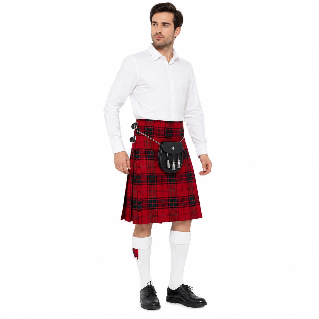 Man wearing a Maxwell Modern Clan Tartan Kilt plaid kilt with a white shirt and black shoes on a white background