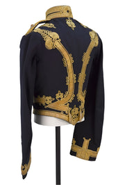 Navy blue military jacket with gold embroidery on a gray background