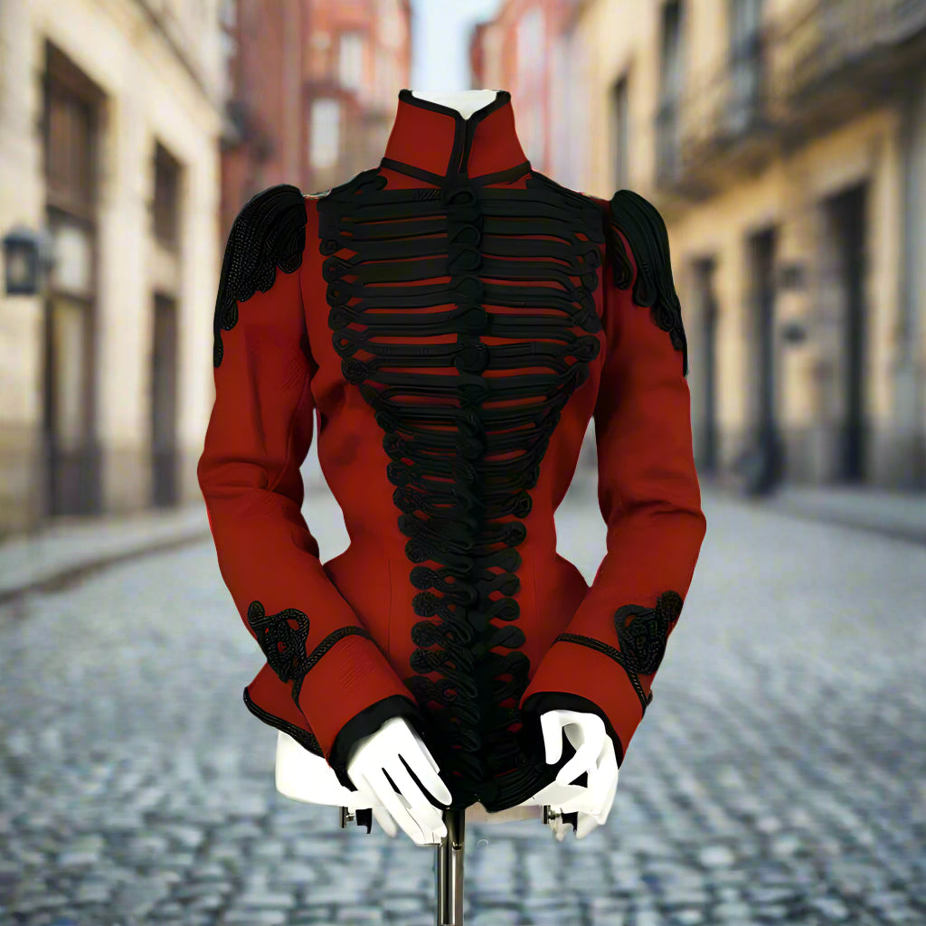Red military-style jacket with black embroidery on a mannequin against a white background