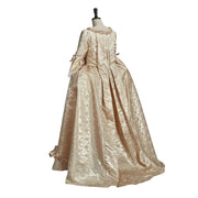 Vintage-style beige dress on a mannequin with 'Legend Costumes' logo.