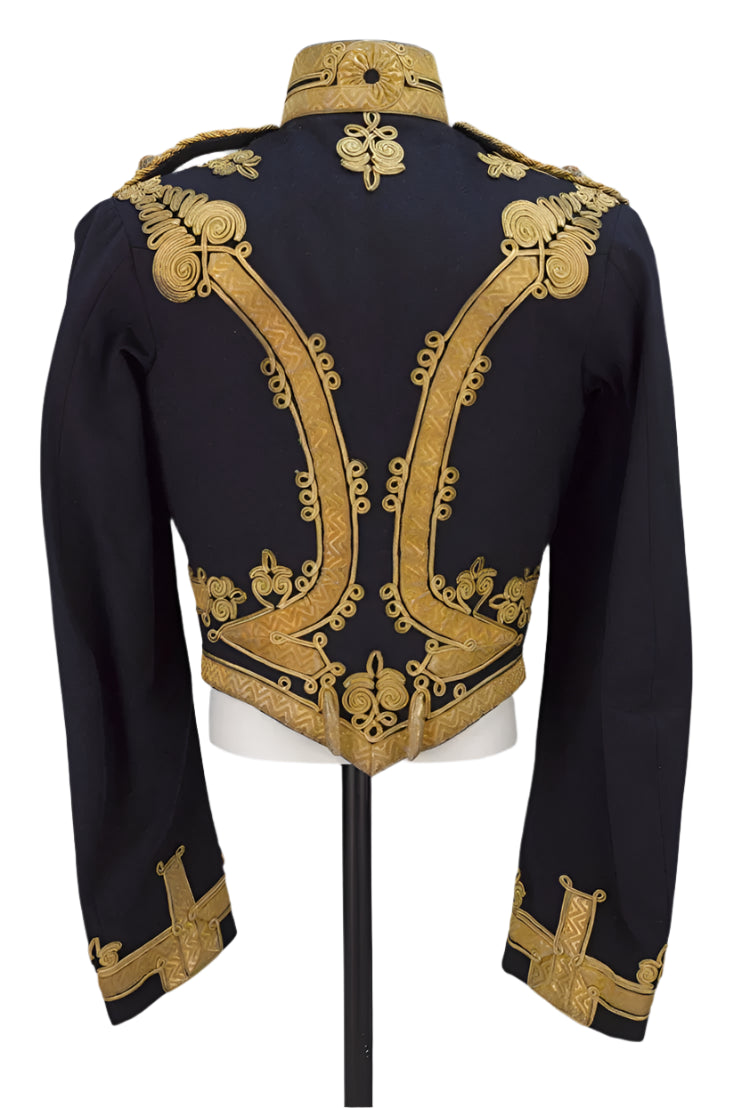 Black military-style jacket with gold embroidery on a mannequin against a gray background