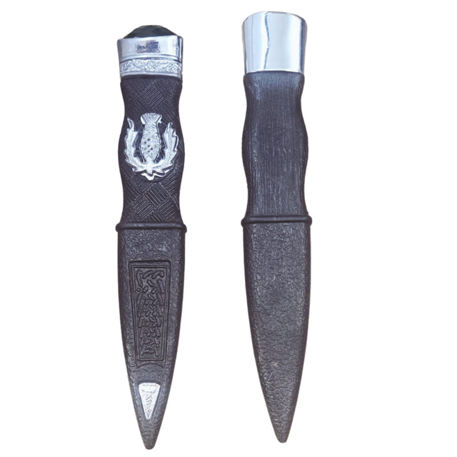 Two decorative knives with silver tops on a white background