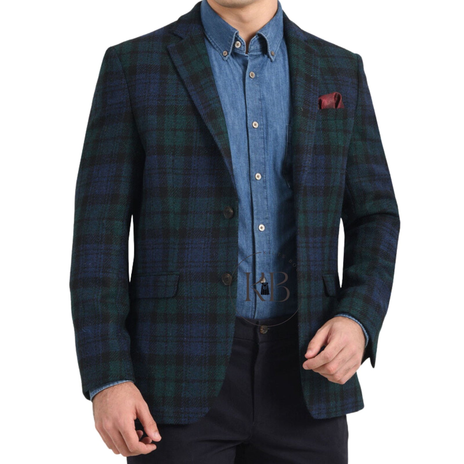 A man wearing a black watch tartan kilt jacket with vest, featuring brown, green, and blue check patterns, fastened with black and gold buttons.