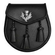Black sporran with thistle emblem and tassels on a white background